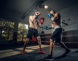 couple-young-boxers-has-competition-ring-fighting-studio