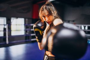 young-woman-boxer-training-gym